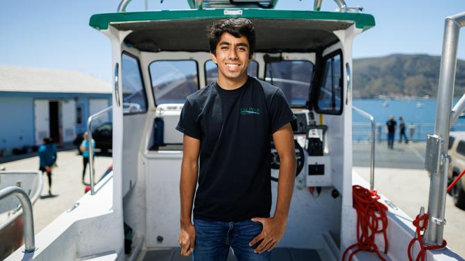 De Ir Hacia on a boat at the Cal Poly Pier