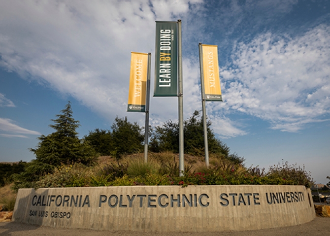 The California Boulevard Cal Poly campus entrance showing a trio of colorful welcome banners